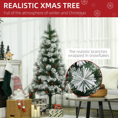Close-up of the realistic branches of the artificial berry Xmas decoration covered in snowflakes