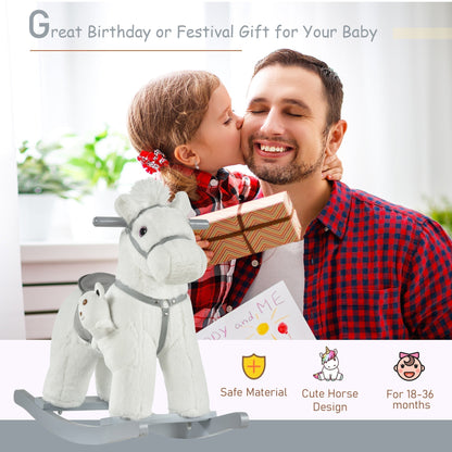 A girl kisses a man while holding the white plush rocking horse toy