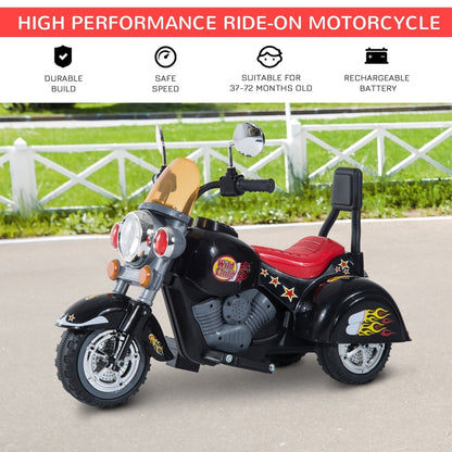 The black electric ride-on motorbike parked on a paved outdoor surface