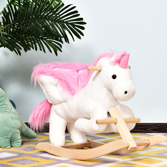 A white plush unicorn rocking horse with pink mane and tail, set on a wooden rocking base
