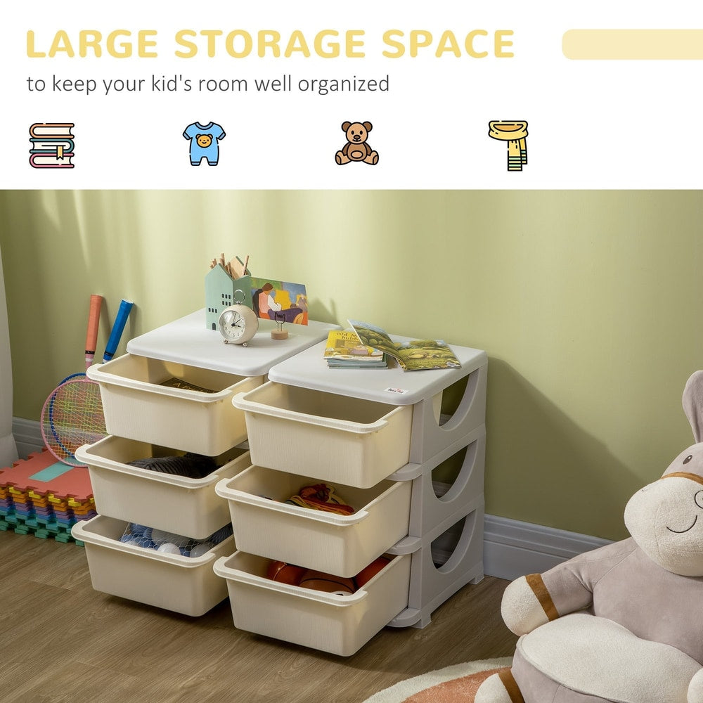 The cream kids storage unit with drawers open showing toys inside