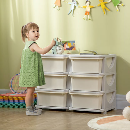 A young girl standing next to the cream kids storage unit in a playroom