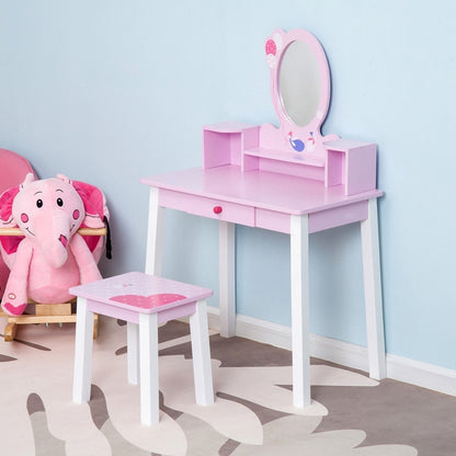 The dressing table set placed in a child's bedroom next to a pink elephant toy