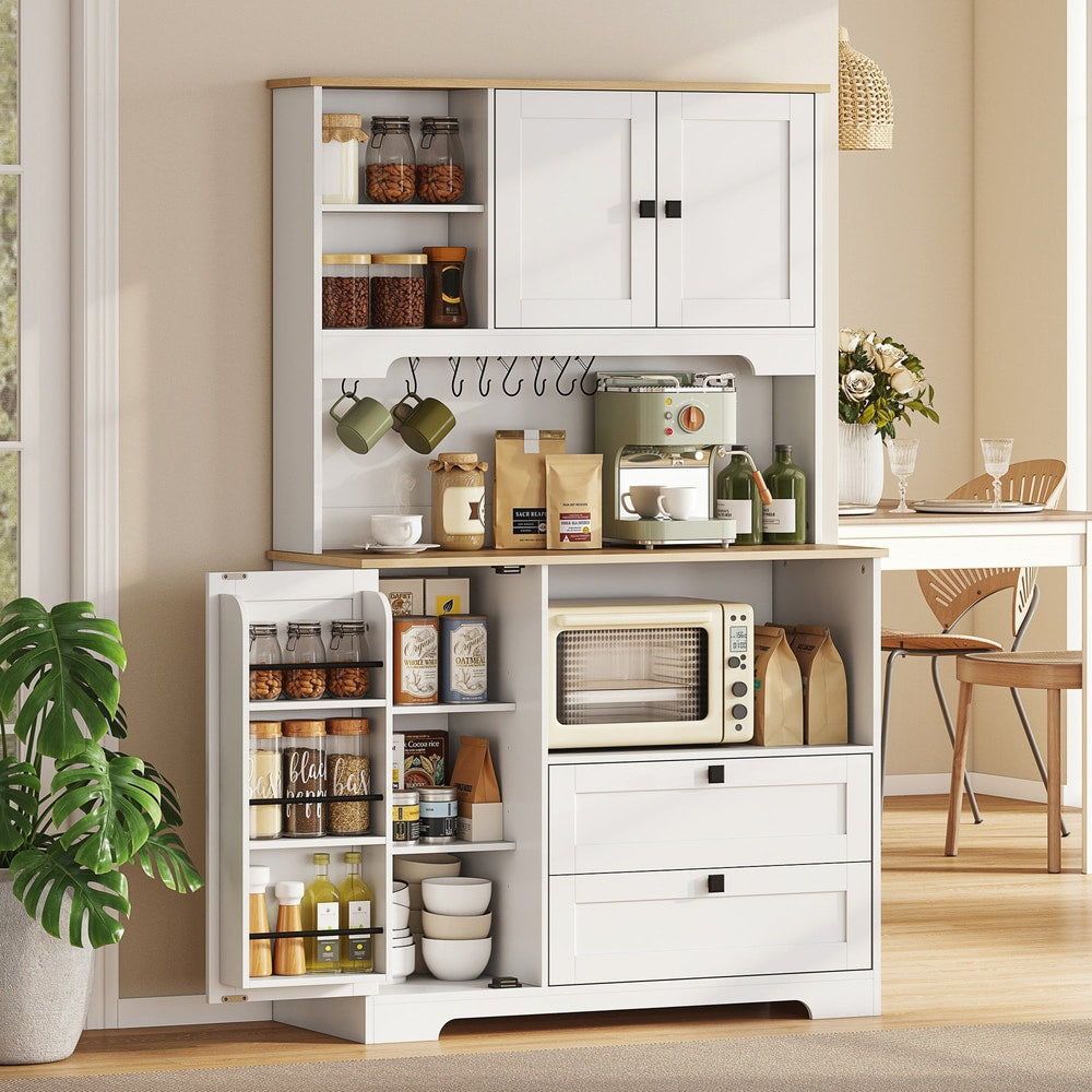 The kitchen cabinet is shown in use with a microwave, coffee machine, and jars on the shelves