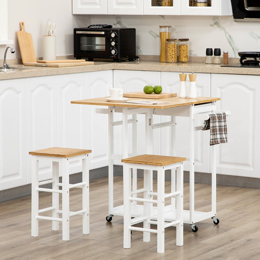 The kitchen furniture set with the drop leaf extended and two stools placed in a modern kitchen
