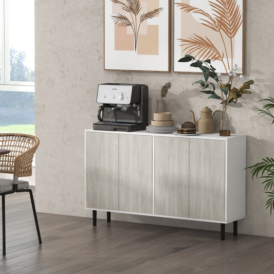 The storage cabinet is shown in a modern living room with a coffee machine on top