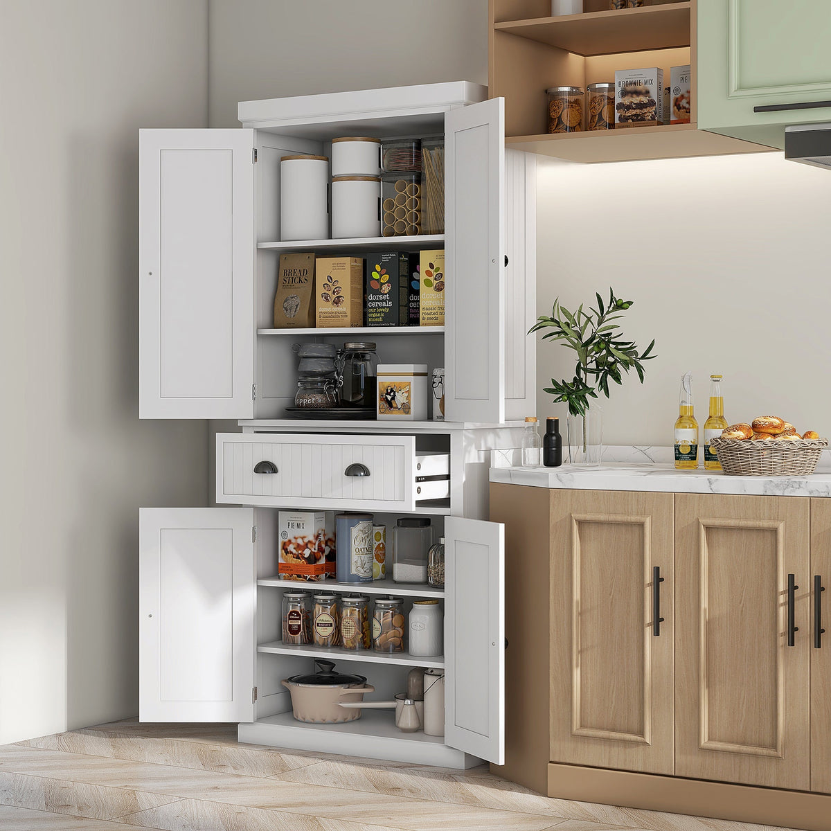 The kitchen storage cabinet is shown in a kitchen setting filled with various food items and cookware