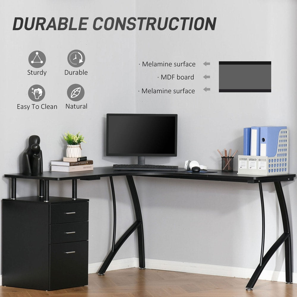 The black computer desk with a monitor and accessories on it