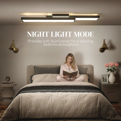 The modern flush mount ceiling lamp providing soft illumination in a bedroom at night