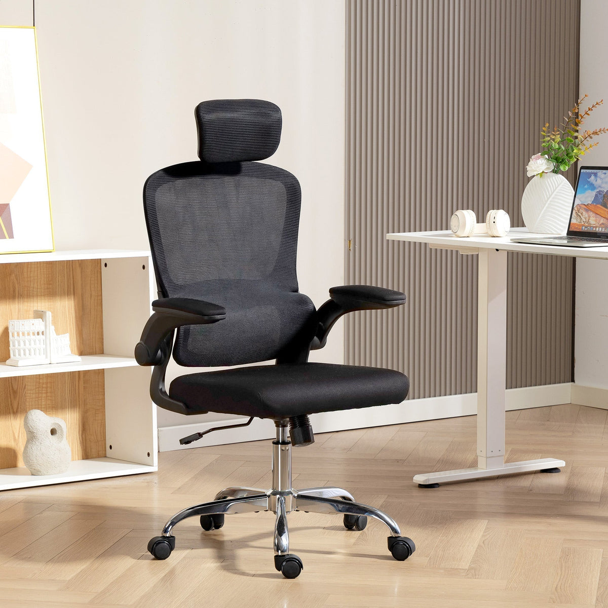 The black mesh back office chair positioned in a modern home office setting