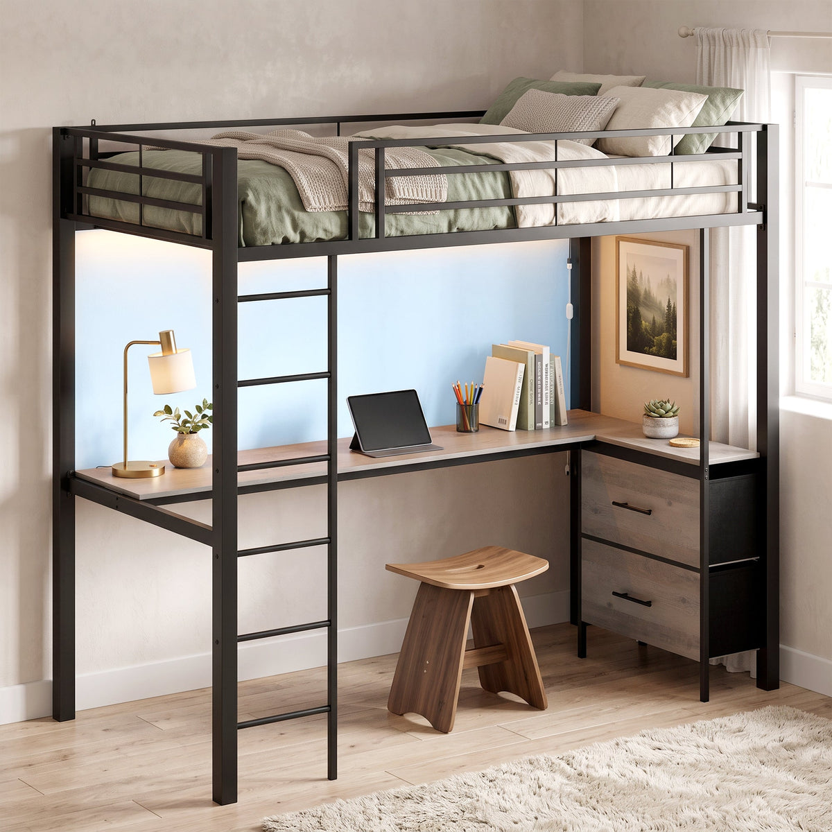 The metal bunk bed styled with a wooden stool, laptop and books on the integrated desk surface