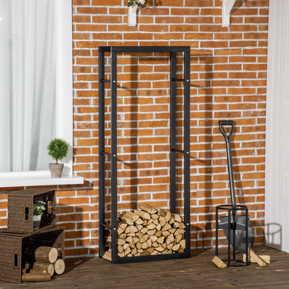 the log holder filled with chopped wood on a patio next to a brick wall