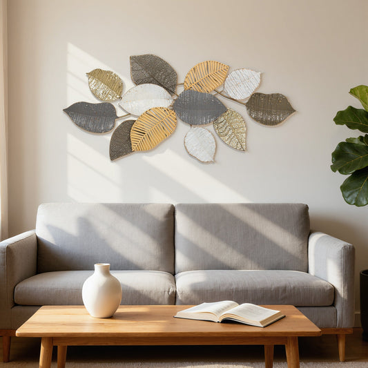 The metal wall decor mounted on a light wall above a grey sofa in a modern living room setting