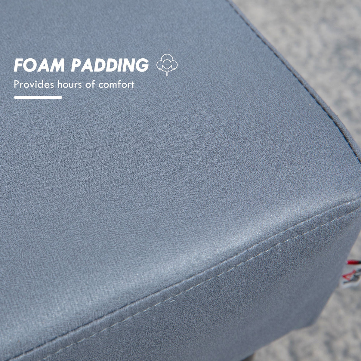 Close-up of the grey fabric on the small sofa stool