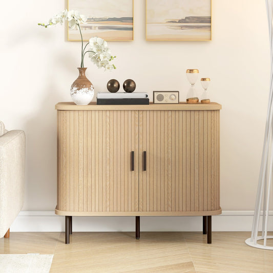 Oak tone sideboard storage cabinet in a living room setting with decorative items