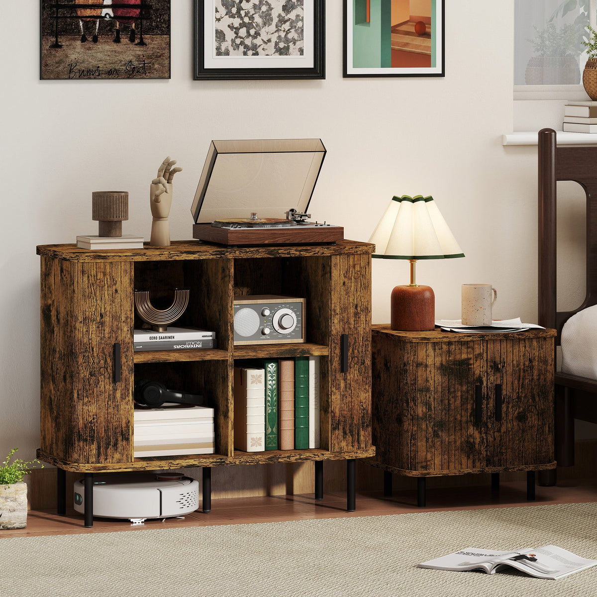The sideboard cabinet and smaller cabinet in a bedroom setting with a record player and lamp