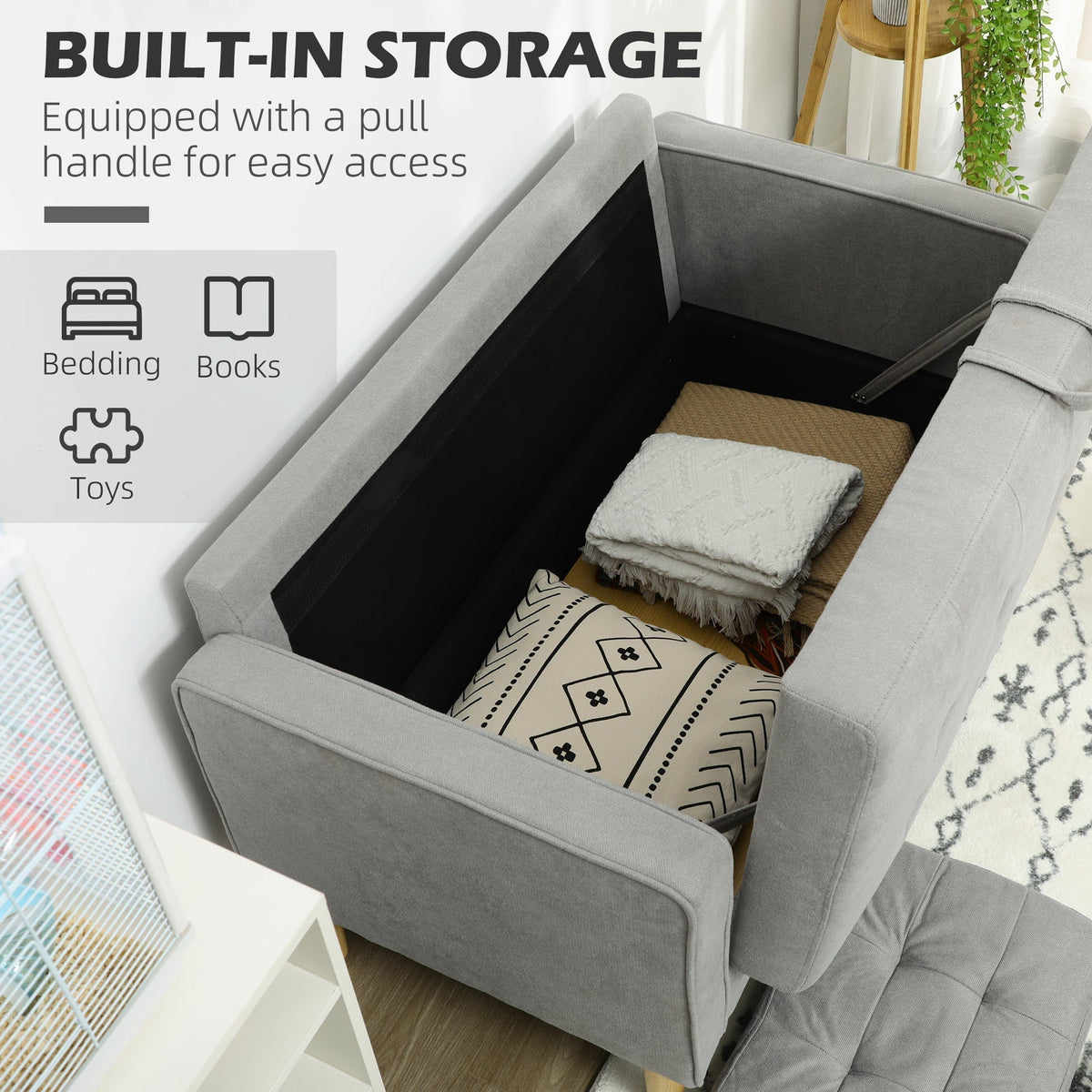 The light grey tufted cotton couch with its seat lifted to reveal hidden storage space inside