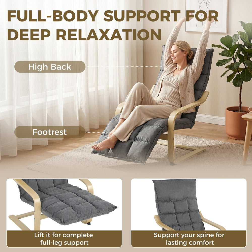 Grey armchair with footrest showing full body support features