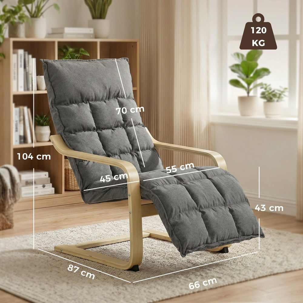 Grey armchair with footrest showing dimensions in cm