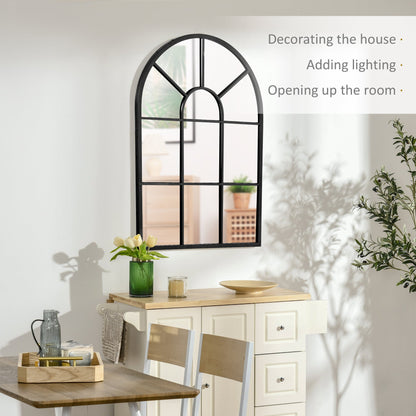 The arched wall mirror is shown on a wall above a kitchen island, adding light