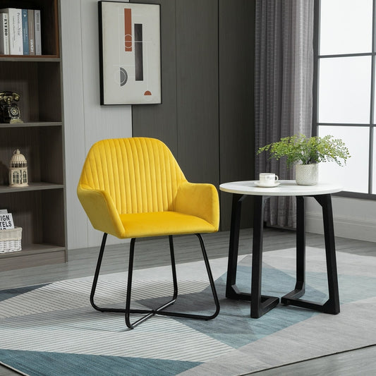 Yellow upholstered accent chair in a modern living room next to a small round table