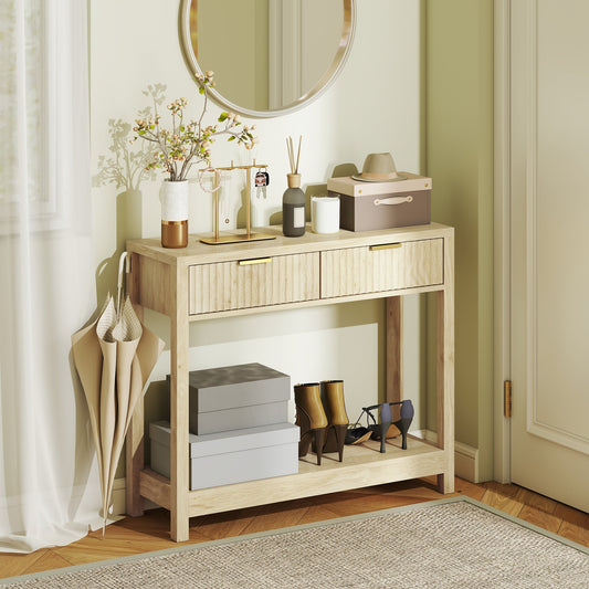 The hallway table styled in an entryway with a mirror, umbrella, and various decorative items