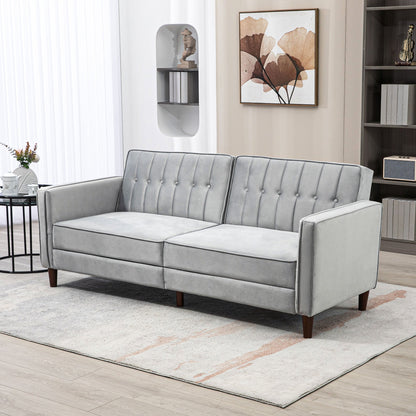 The light grey sofa futon set up as a sofa in a modern living room setting
