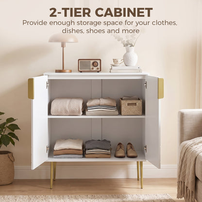 The white storage cabinet with gold curved line details is open, showing two shelves of folded clothes and shoes