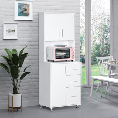 The kitchen furniture standing in a bright room with a small oven on the open countertop