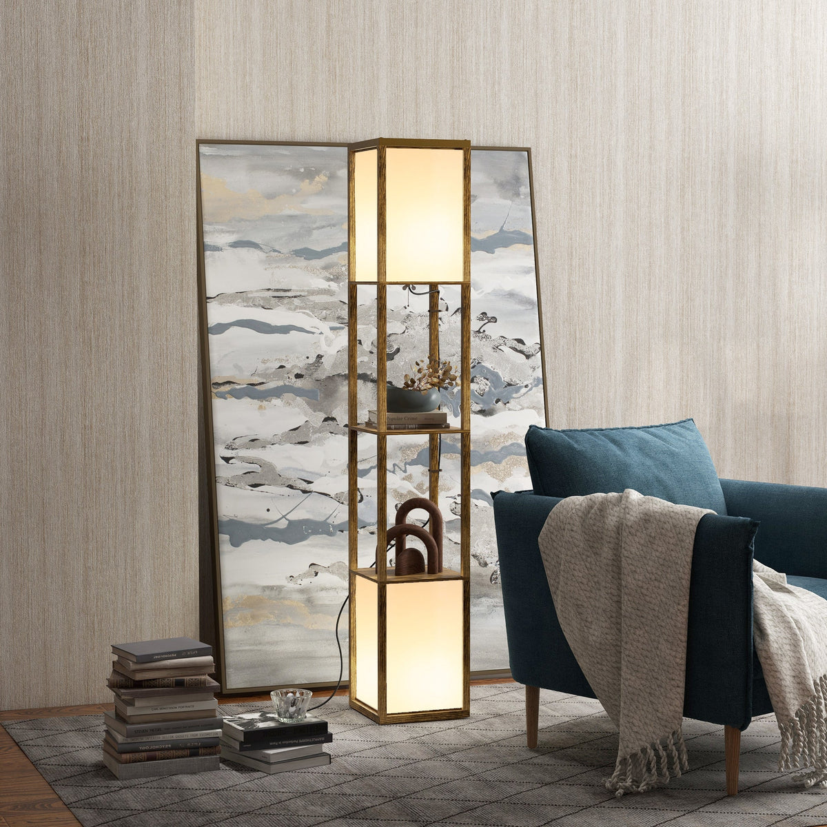 The modern shelf floor lamp with dual ambient light in a living room setting next to a blue armchair
