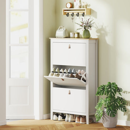 White shoe storage cabinet with two drawers open, showing shoes inside
