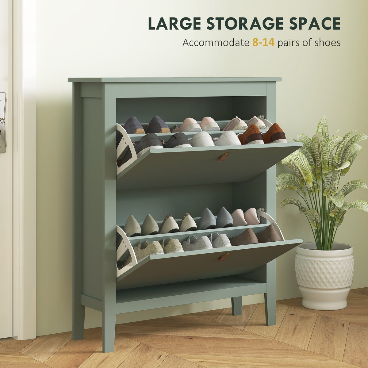 Green shoe storage cabinet with both flip-down drawers open, displaying multiple pairs of shoes