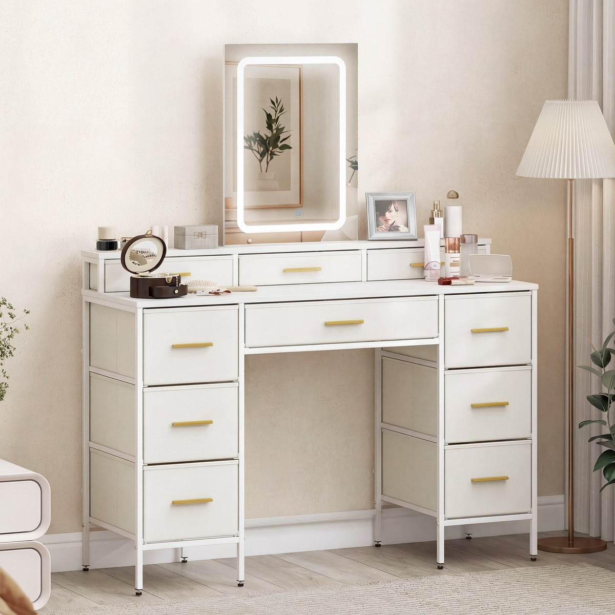 the white dressing table styled with beauty products in a bright bedroom setting