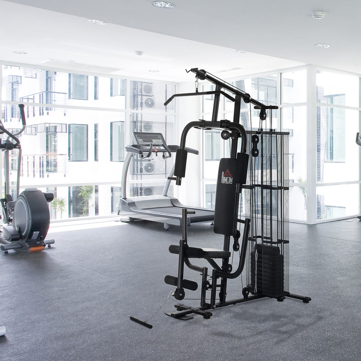 The home gym system set up in a bright, modern room with other exercise equipment