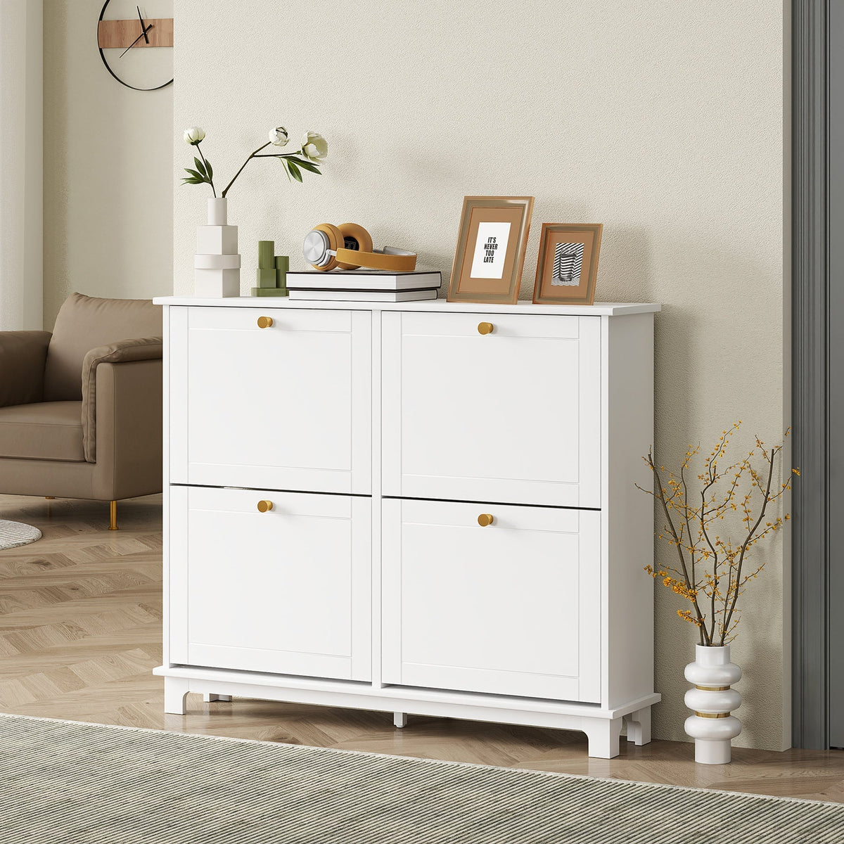 A white shoe storage cabinet with four flip drawers in a hallway setting