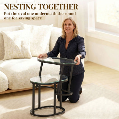 Woman demonstrating how the nesting coffee tables can be stored together to save space