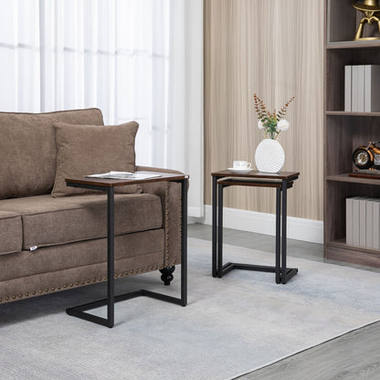 The side tables placed in a living room next to a brown sofa with a vase and cup on top