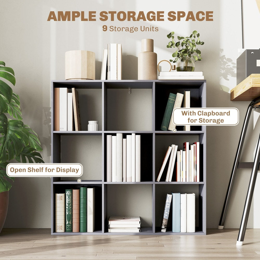 Grey nine-cube storage shelf unit with books and decorative items displayed
