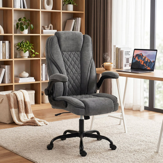 The office chair placed in a bright home study next to a wooden desk and a bookshelf