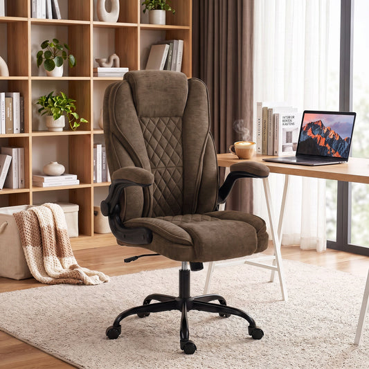 Brown fabric office chair in a home office setting with a laptop on the desk