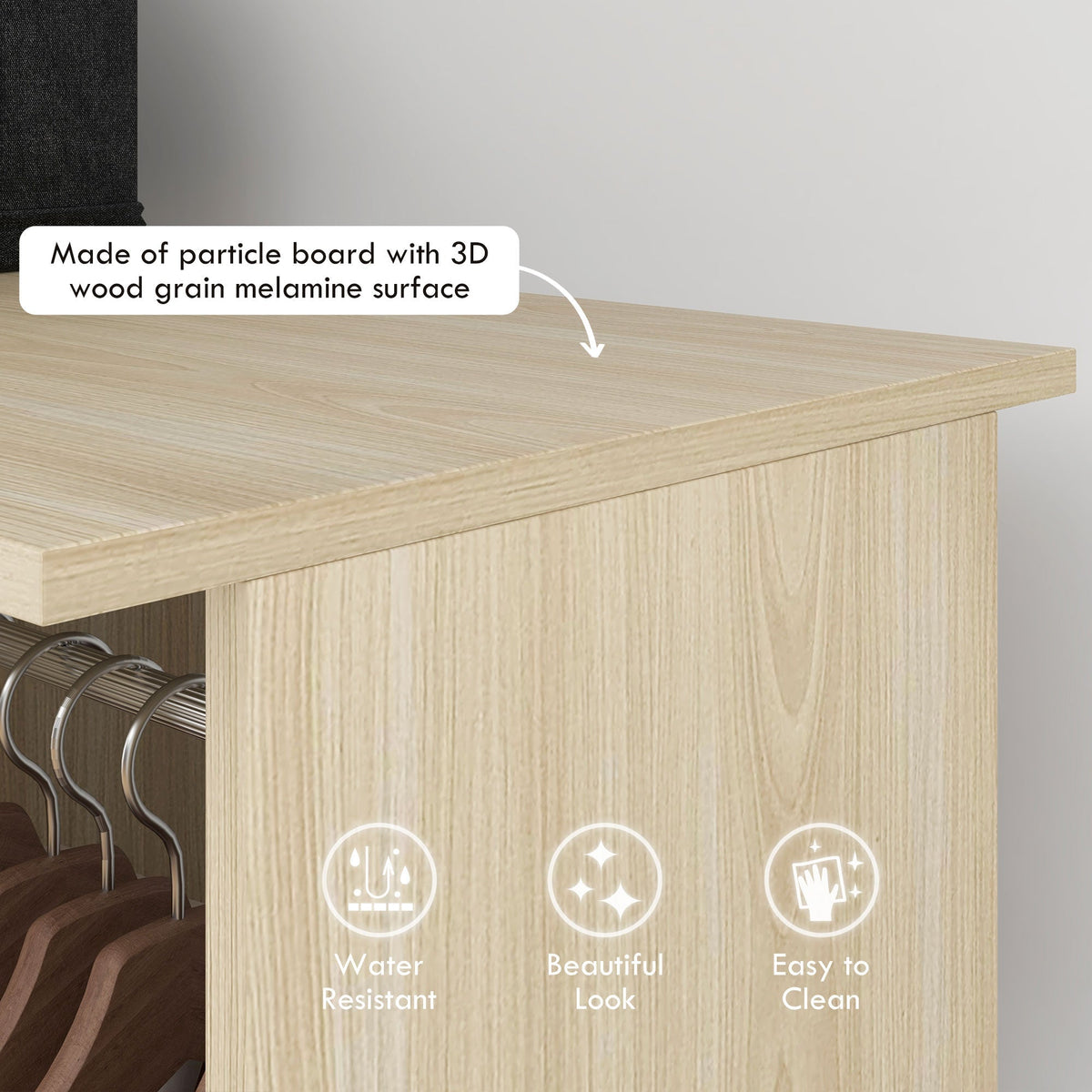 The open wardrobe showing the wood grain melamine surface with icons for water resistance, beautiful look and easy cleaning