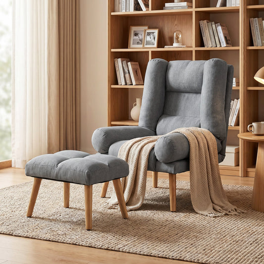 The grey recliner armchair and footstool placed in a cosy living room with a knitted throw