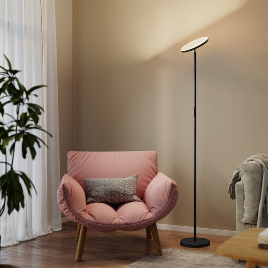 the floor lamp in a modern living room next to a pink armchair