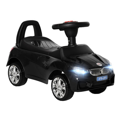 HOMCOM Ride on Car, a black sliding car with a steering wheel and four wheels