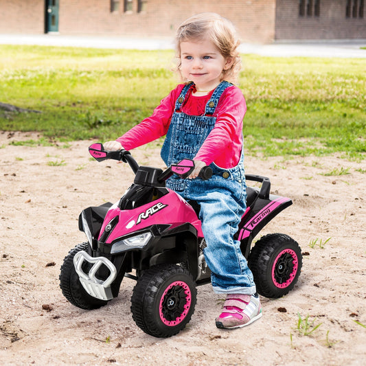 A young child sitting on the pink ride-on car outdoors on a sandy path