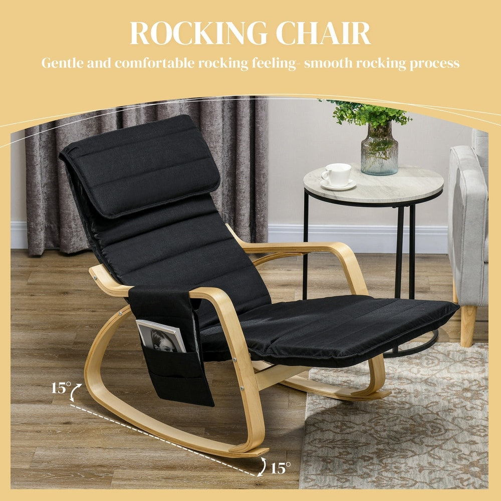 The black rocking chair placed in a living room next to a small round side table