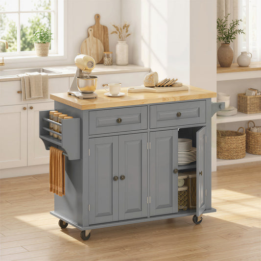 The kitchen furniture placed in a bright room with kitchenware and food items on the work surface