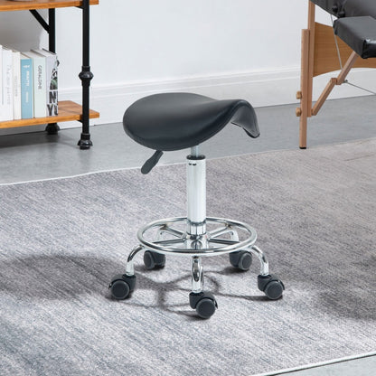 The rolling saddle chair is shown in a room with a massage table in the background