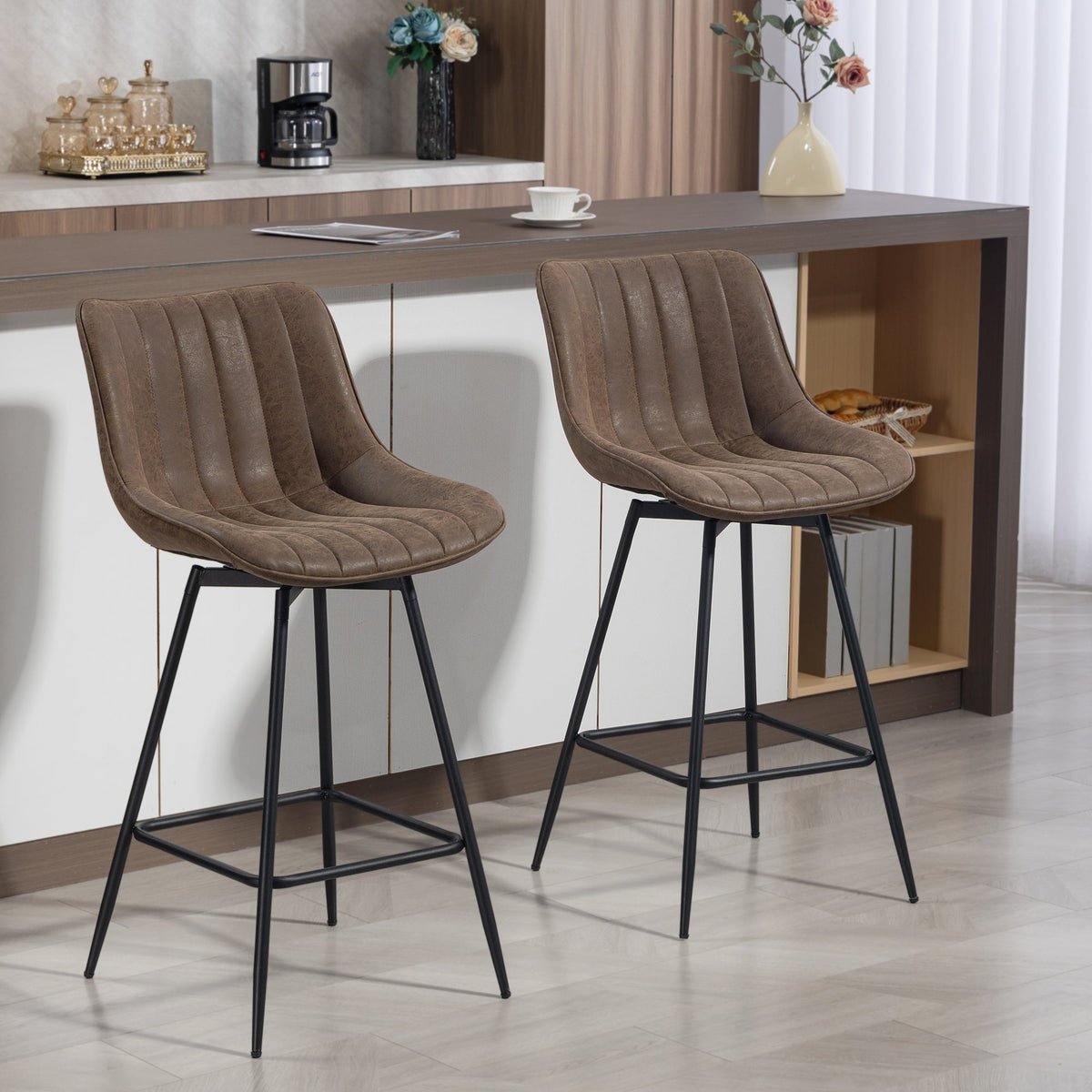 Two brown PU leather swivel bar stools in a modern kitchen setting