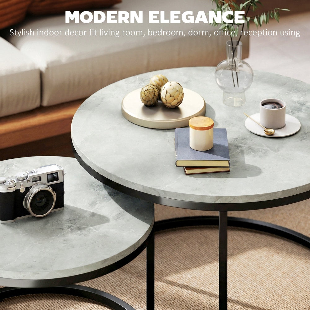 Close up of the grey marble effect surface of the coffee tables with decorative items